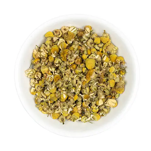 Chamomile flowers in dish